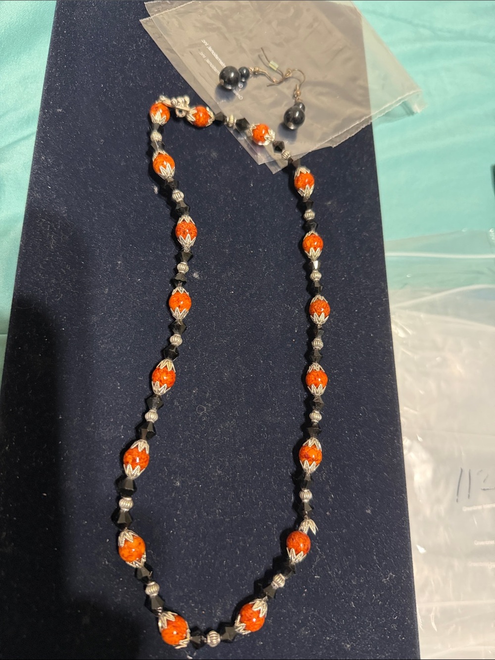 Handcrafted Orange and Black Bead Necklace with Matching Earrings